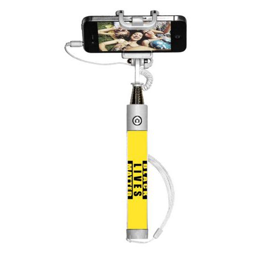 Personalized selfie stick personalized with "Black Lives Matter" black on yellow design